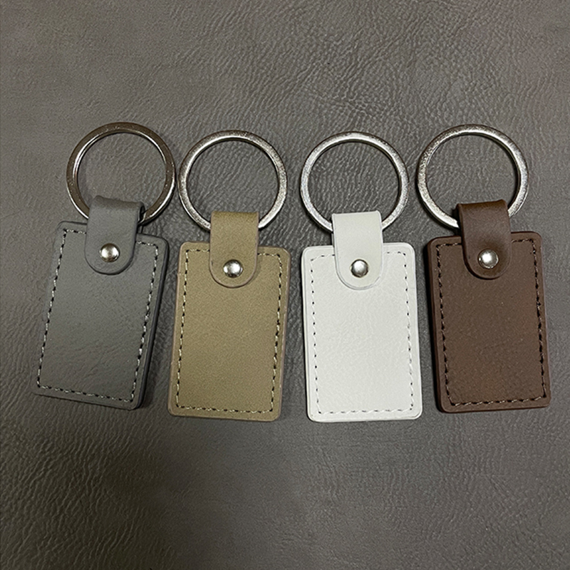 기름칠된 가장자리가 있는 레이저 가공 가능한 인조 가죽 직사각형 키체인
